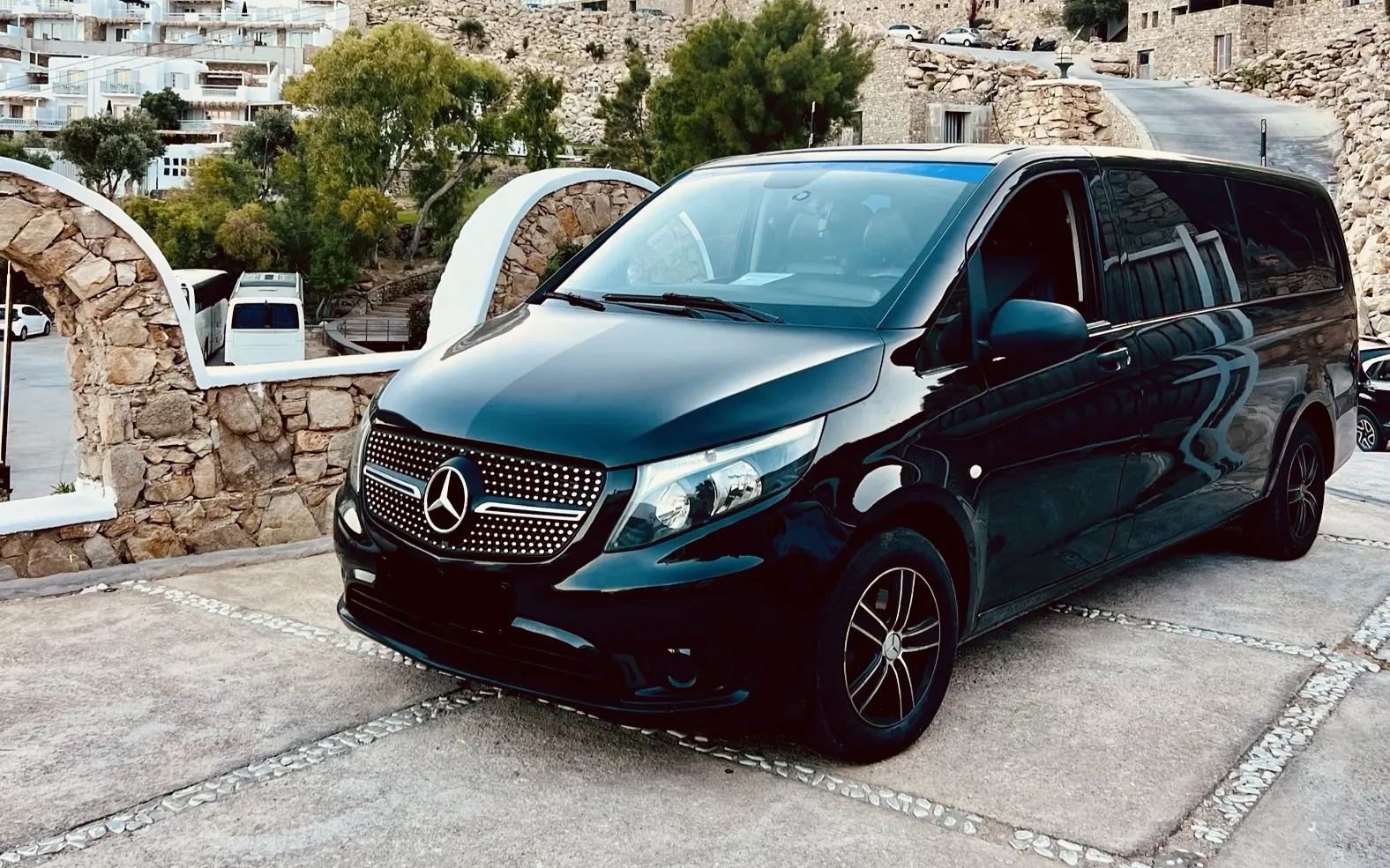 Black Mercedes luxury van for private airport transfers in Mykonos